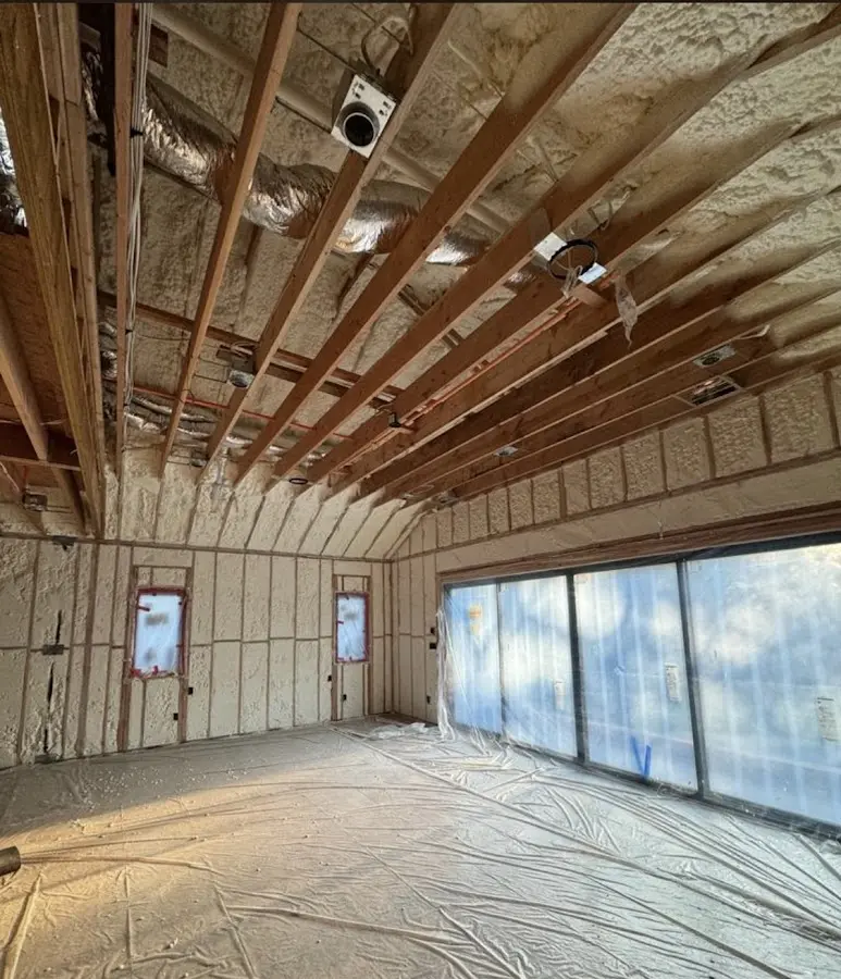 Interior walls and ceiling insulated with spray foam during new construction in Lake Norman of Iredell